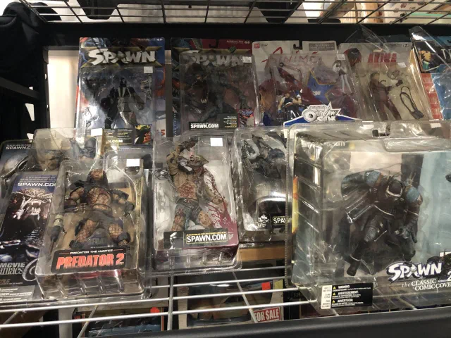 Carded McFarlane Toys Spawn figures on a shop rack