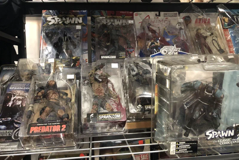 Carded McFarlane Toys Spawn figures on a shop rack