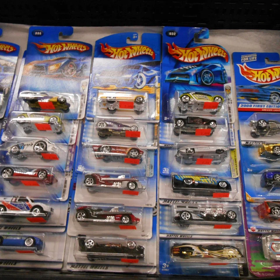 Rows of carded Hot Wheels die-cast cars