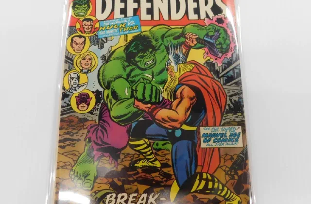 The Defenders #10, Hulk versus Thor, in a bag and board
